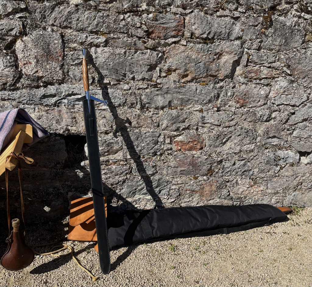 A longsword propped against the wall at Berry Pomeroy Castle.